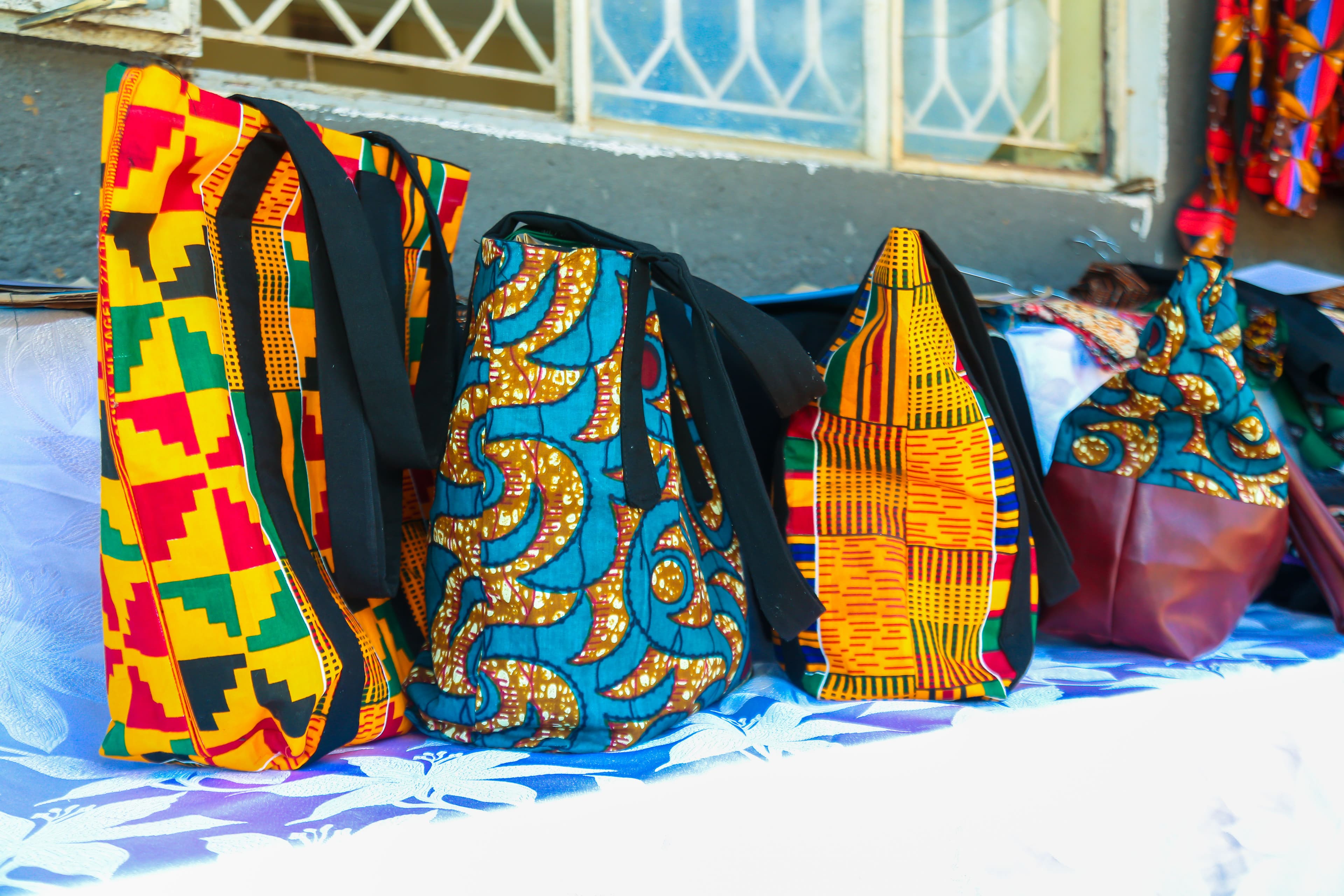 Women learning tailoring skills